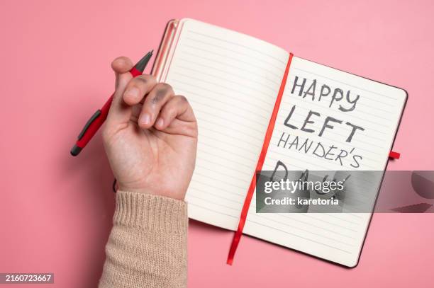 dirty left hand after writing - left handed stock pictures, royalty-free photos & images