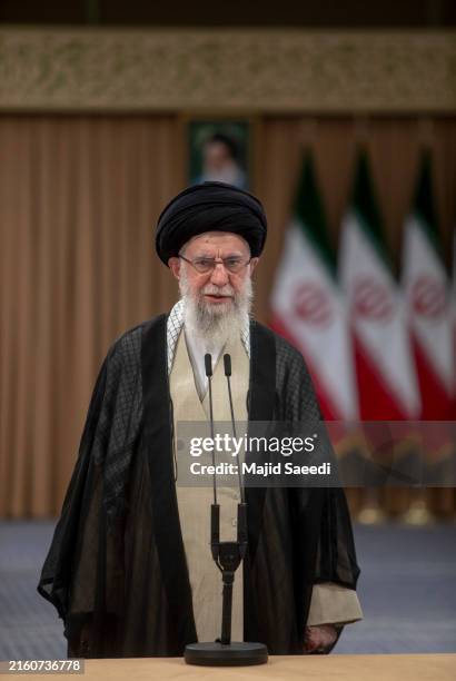 Iranian Supreme Leader Ayatollah Ali Khamenei speaks after casting his vote for the presidential runoff election on July 5, 2024 in Tehran, Iran. The...