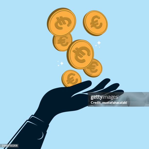 golden european union coins falls into an open hand - european-union-euro-note stock illustrations