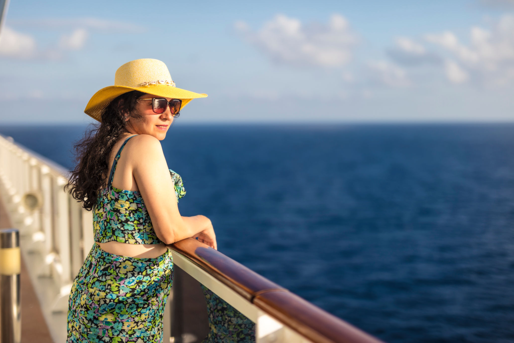 Woman on cruise vacation and enjoying ocean view Woman on cruise vacation and enjoying ocean view