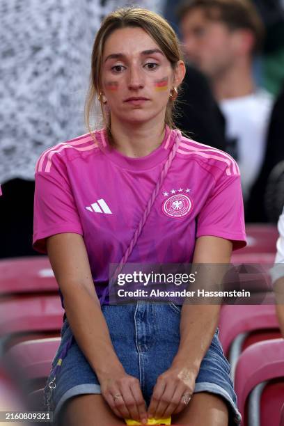 Lena Wurzenberger, partner Julian Nagelsmann, head coach of Germany reacts after the UEFA EURO 2024 quarter-final match between Spain and Germany at...