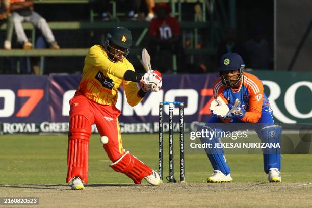 Zimbabwe's Wellington Masakadza plays a shot during the third T20 international cricket match between Zimbabwe and India at Harare Sports Club in...