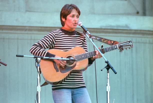 Joan Baez performs during the Bread & Roses Benefit at the Greek Theatre on October 9, 1981 in Berkeley, California.