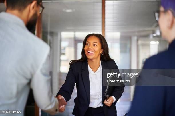 job search graduate gets the good news - purple suit stock pictures, royalty-free photos & images
