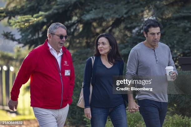 Phil Deutch, managing partner at Energy Technology Partners, from left, Sheryl Sandberg, former chief operating officer of Meta Platforms Inc., and...