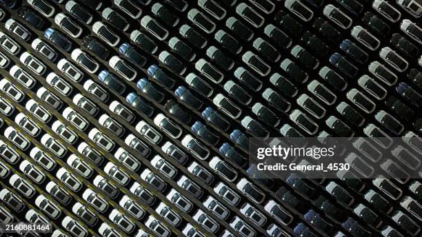aerial top view new car lined up in the port for import and export business logistic to dealership for sale. - hybrid car stock pictures, royalty-free photos & images