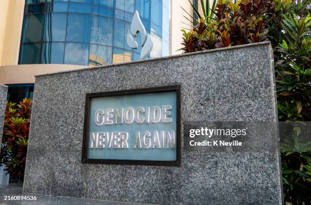 kigali street sign about the 1994 genocide - kigali stock pictures, royalty-free photos & images