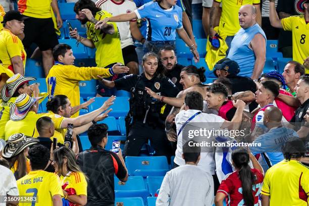 Uruguay forward Darwin Núñez engages with hostile fans in the stands after the CONMEBOL Copa America semifinal between Uruguay and Colombia on...