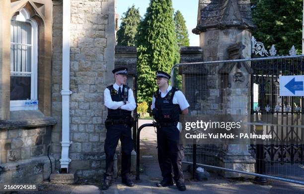 Police officers outside Lavender Hill Cemetery in Enfield, north London, where triple murder suspect Kyle Clifford was found with injuries on...