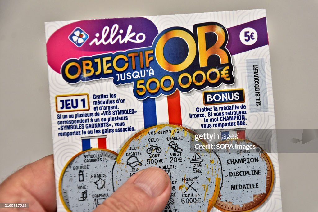 In this photo illustration, a man is holding a winning 50...