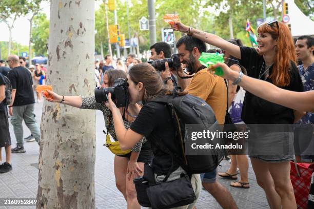Demonstrators march during a protest against mass tourism which have multiplied in recent months across Spain, the world's second-most visited...