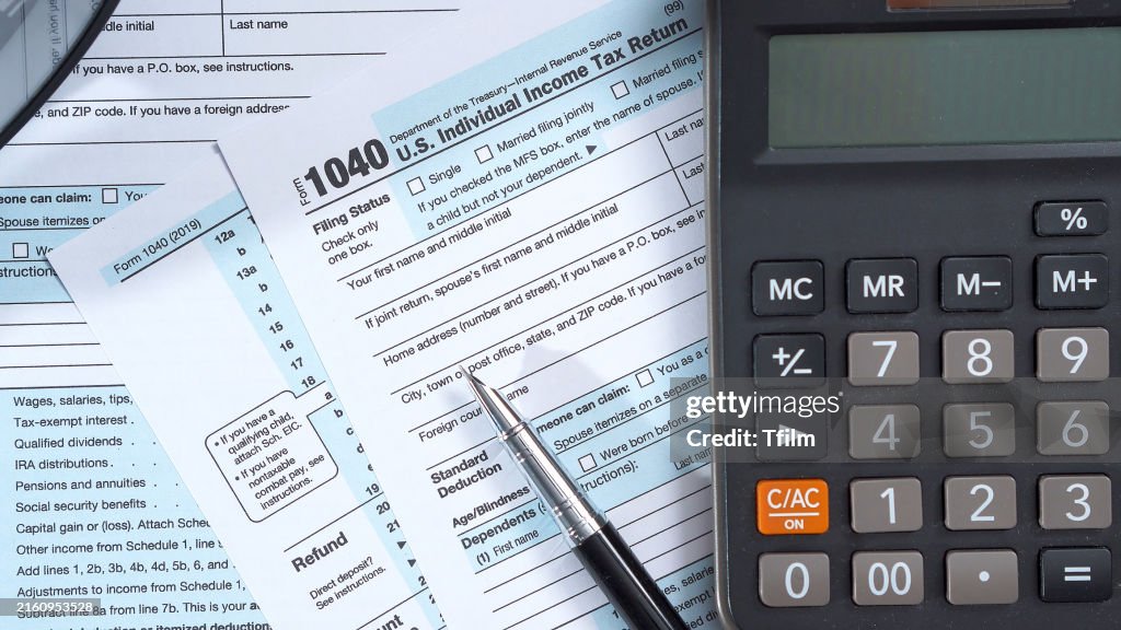 Tax Forms and Calculator on Desk
