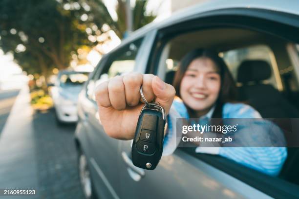 finally behind the wheel of my dreams. - car insurance stock pictures, royalty-free photos & images