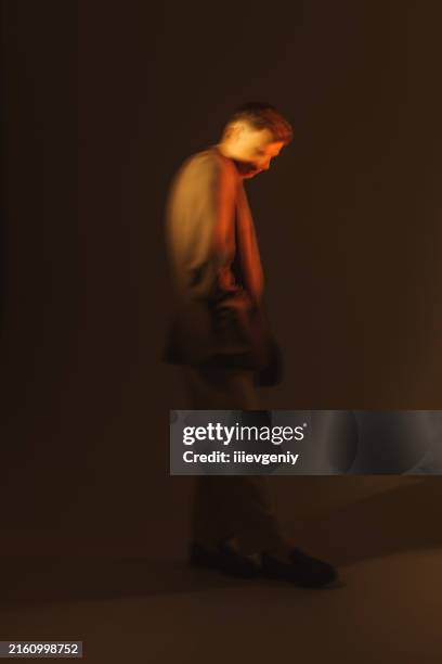 man in studio. portrait. - vintage polo shirt stockfoto's en -beelden