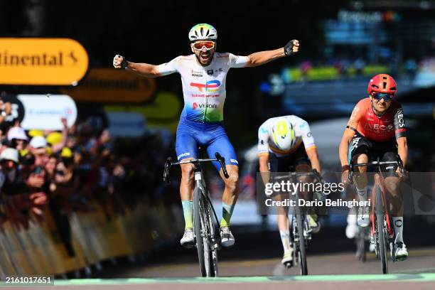 Anthony Turgis of France and Team TotalEnergies celebrates at finish line as stage winner ahead of Tom Pidcock of The United Kingdom and Team INEOS...