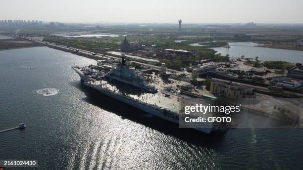 Tourists visit the aircraft carrier Kyiv in Tianjin, China, May 2, 2024.