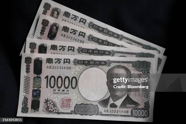 Japanese 10,000 yen banknotes arranged for a photograph in Tokyo, Japan, on Friday, July 12, 2024. Japan's top currency official continued his...