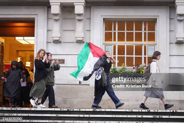 Pro-Palestine activists leave the Hackney Council pension committee meeting at Hackney Town Hall, where they demanded the council divest from...