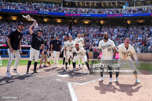 Members of the Minnesota Twins celebrate a walk-off home run hit by Christian Vazquez against the Houston Astros on July 7, 2024 at Target Field in...