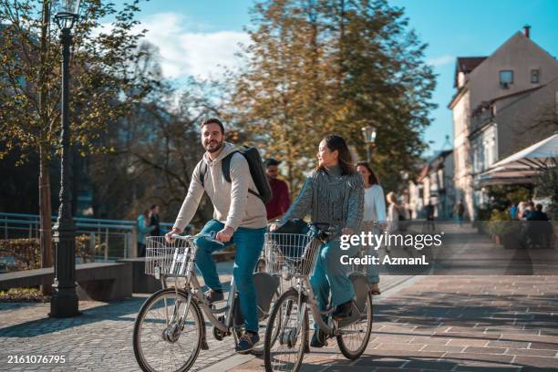 Friends Riding Bicicle 20,351 Friends On Bicycle Stock Photos, High-Res Pictures, and Images ...