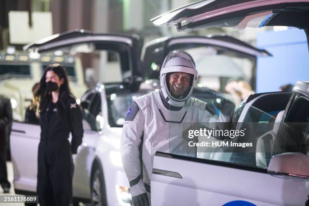Astronaut Robert Hines waves to family and friends as he and crew mates NASA astronauts Kjell Lindgren, Jessica Watkins, and ESA astronaut Samantha...