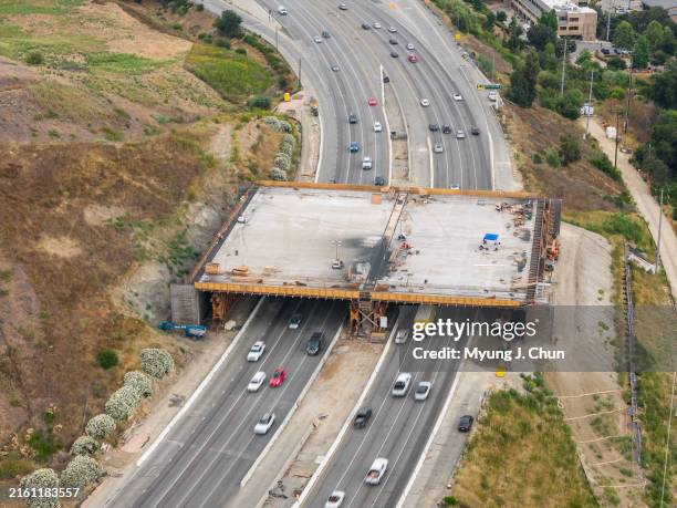 The Wallis Annenberg Wildlife Crossing under construction over the 101 freeway near Liberty Canyon Road in Agoura Hills, CA on Friday, July 12, 2024.