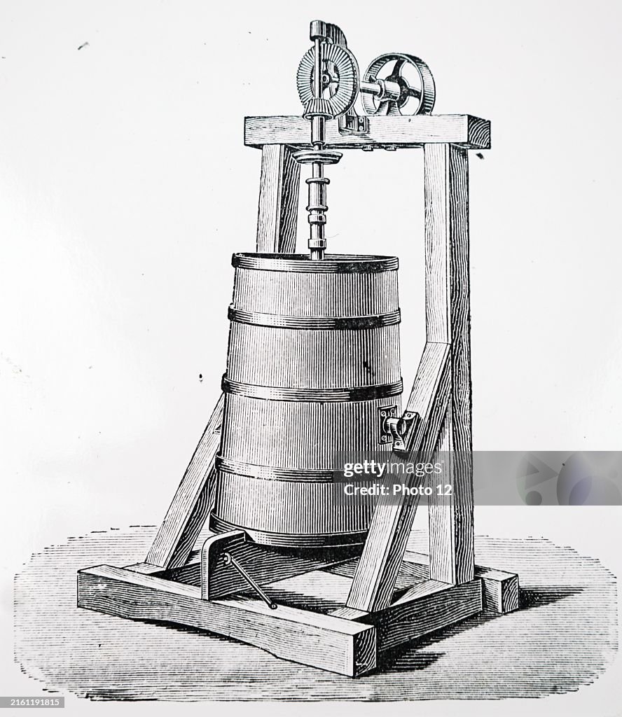 A Holstein vertical butter churn