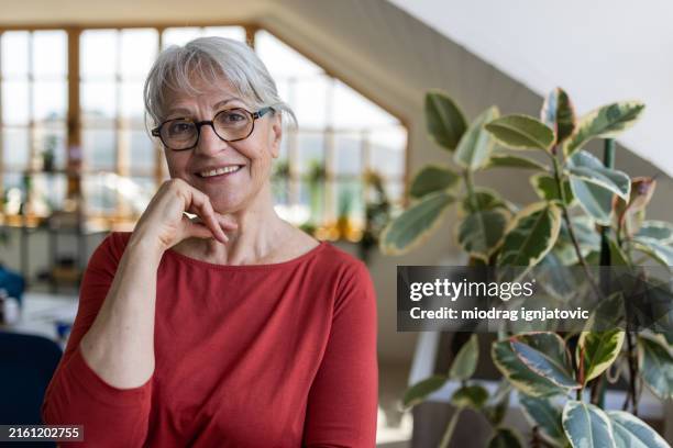 charming elderly woman - charming stock pictures, royalty-free photos & images