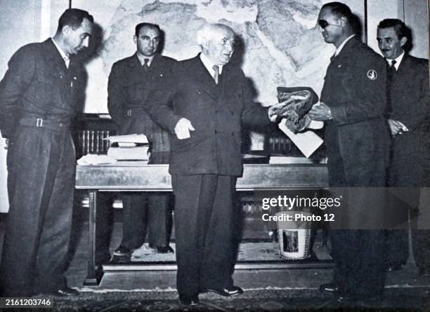 Photograph of Prime Minister David Ben-Gurion meeting with Moshe Sharett , Moshe Dayan and Mordechai Makleff . Dated 20th Century.