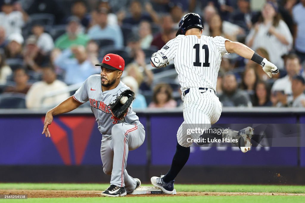 Anthony Rabe Cincinnati Jeimer Candelario of the Cincinnati Reds and Anthony Volpe of the New ...