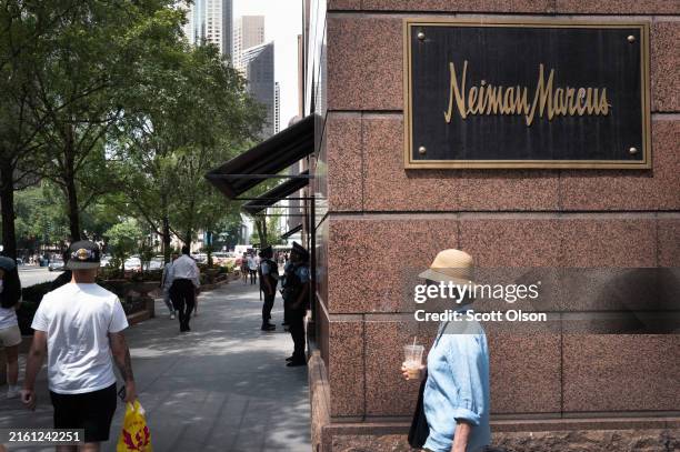 Sign marks the location of a Neiman Marcus store along the Magnificent Mile on July 08, 2024 in Chicago, Illinois. HBC, parent company of Saks Fifth...