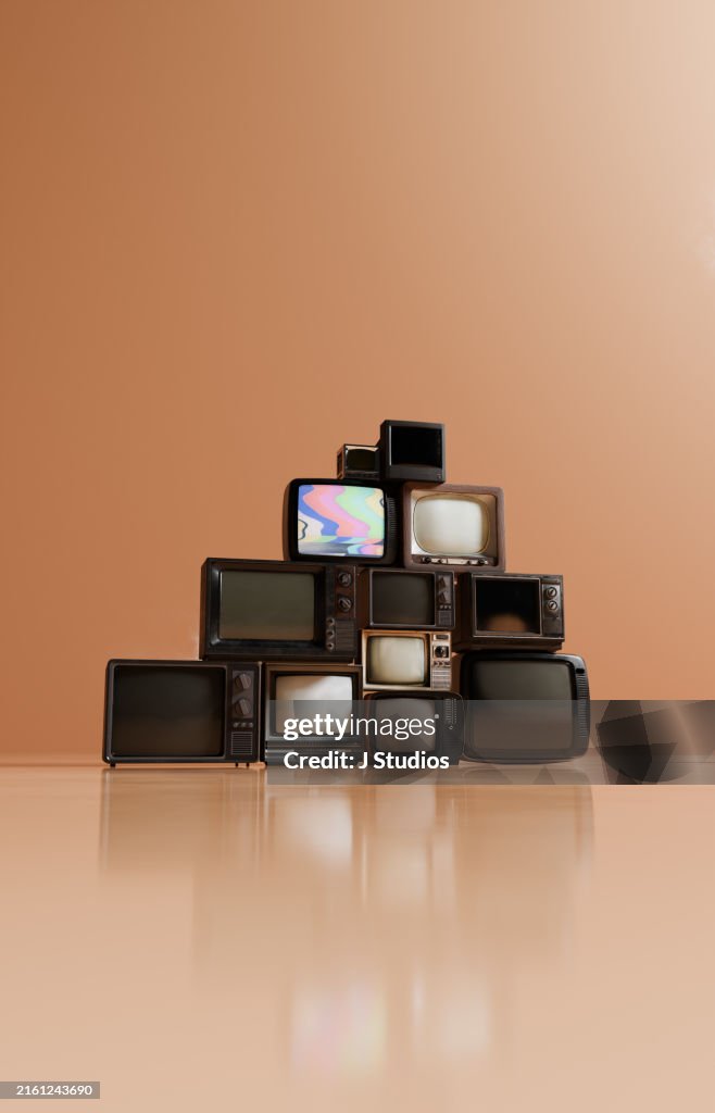 TVs stacked on top of each other
