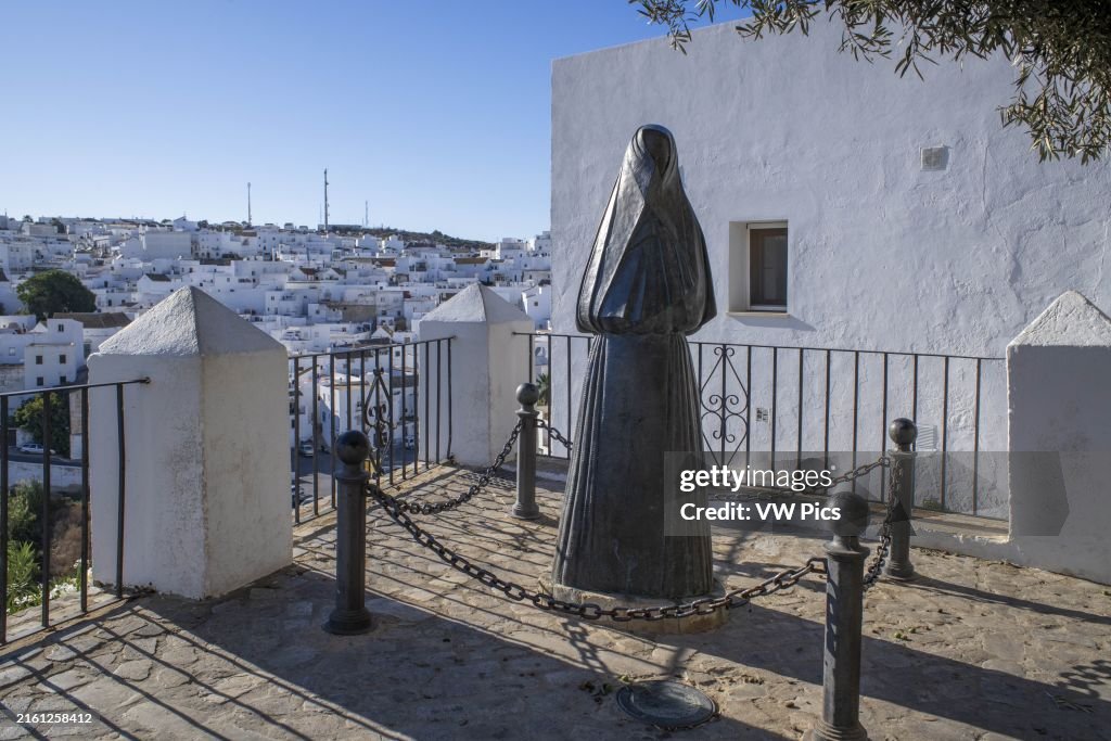 Statue of Woman with traditional black dress Las Cobijadas in Vejer de la Frontera