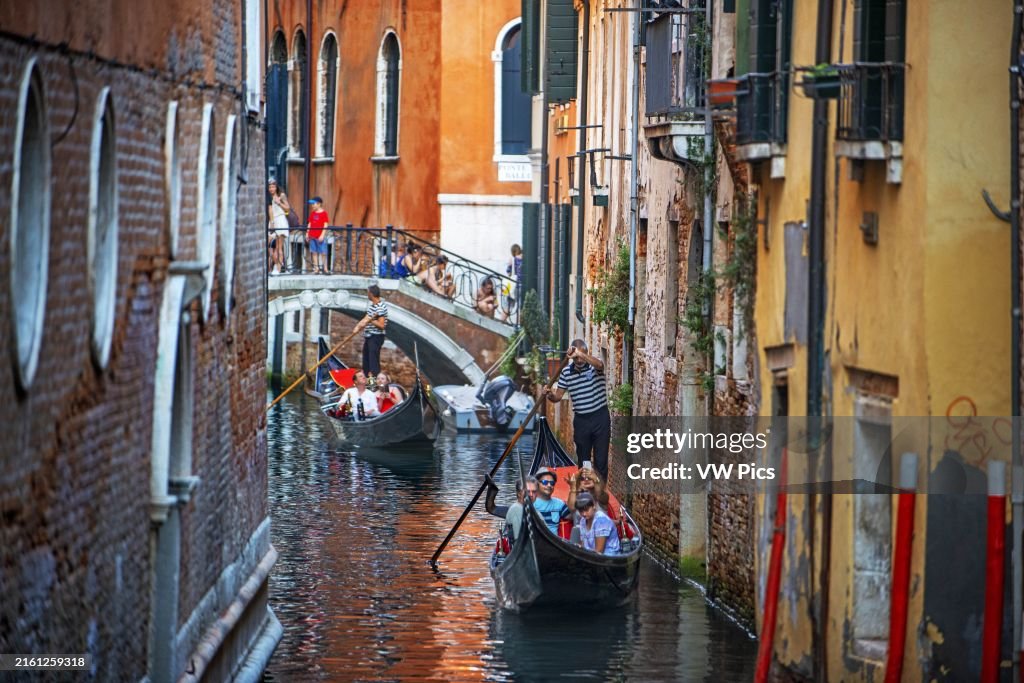Gondolier in small canals