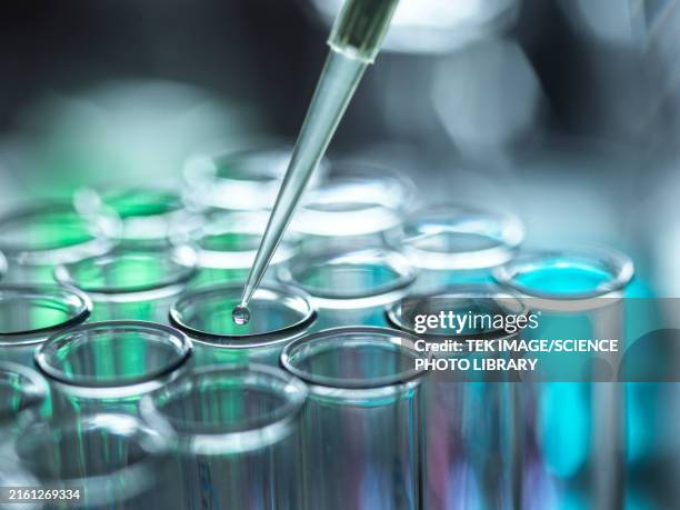 biotechnology research, conceptual image - laboratoriumglas stockfoto's en -beelden