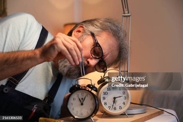 watchmaker - clock repair stock pictures, royalty-free photos & images