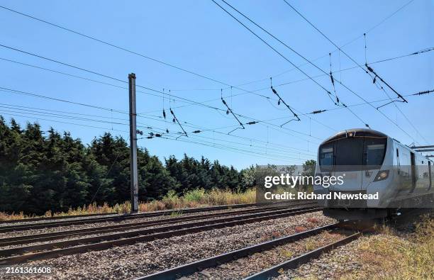 train travel - electric train stock pictures, royalty-free photos & images