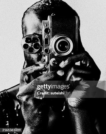 The woman with the camera. The woman with the camera.