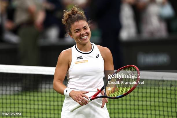 Jasmine Paolini of Italy celebrates winning match point against Emma Navarro of United States in the Ladies' Singles Quarter Final match during day...
