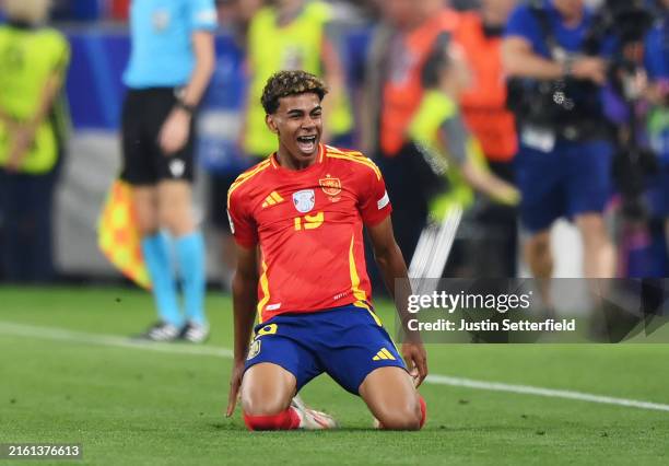 Lamine Yamal of Spain celebrates scoring his team's first goal during the UEFA EURO 2024 Semi-Final match between Spain and France at Munich Football...
