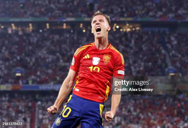 Dani Olmo of Spain celebrates scoring his team's second goal during the UEFA EURO 2024 Semi-Final match between Spain and France at Munich Football...