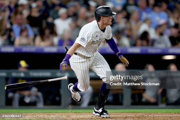 Aaron Schunk of the Colorado Rockies bats against the Milwaukee Brewers in the eighth inning at Coors Field on July 03, 2024 in Denver, Colorado.