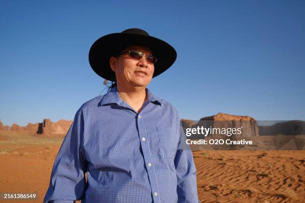 man in monument valley - monument valley stock pictures, royalty-free photos & images