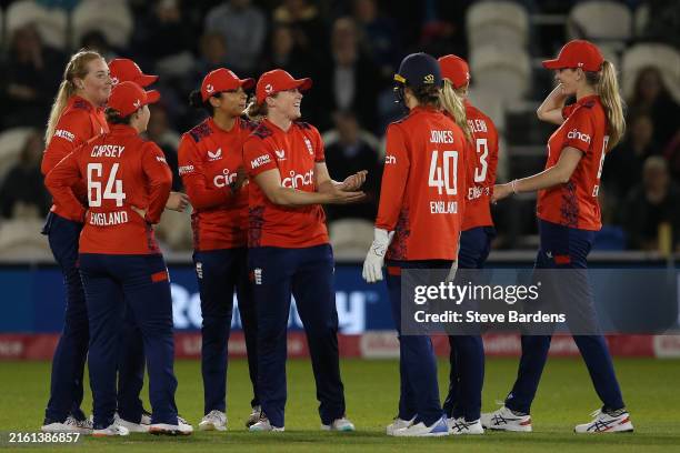 Heather Knight of England celebrates with her team mates after taking the wicket of Jess Kerr of New Zealand during the 2nd Women's Vitality IT20...