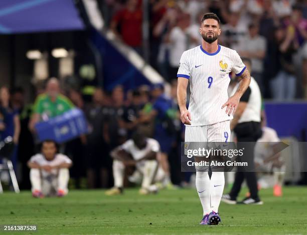 Olivier Giroud of France looks dejected as he leaves the pitch after defeat to Spain during the UEFA EURO 2024 Semi-Final match between Spain and...