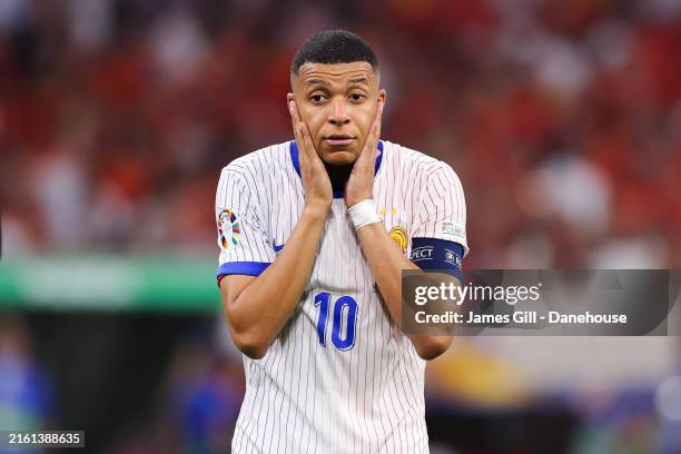 Kylian Mbappe of France looks dejected after the UEFA EURO 2024 semi-final match between Spain v France at Munich Football Arena on July 09, 2024 in...