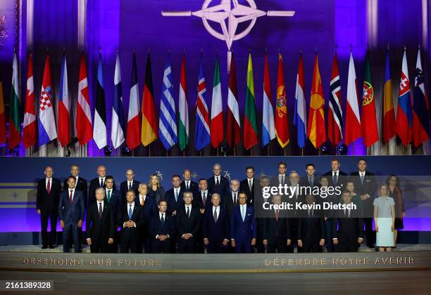 Heads of state pose for a group photo during the NATO 75th anniversary celebratory event at the Andrew Mellon Auditorium on July 9, 2024 in...