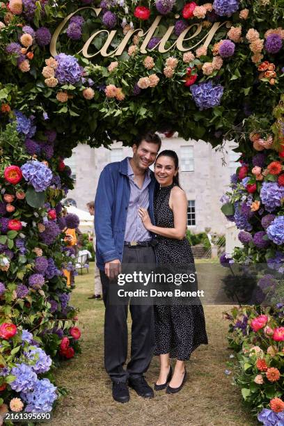 Ashton Kutcher and Mila Kunis attend Cartier Style Et Luxe at the Goodwood Festival of Speed on July 14, 2024 in Chichester, England.