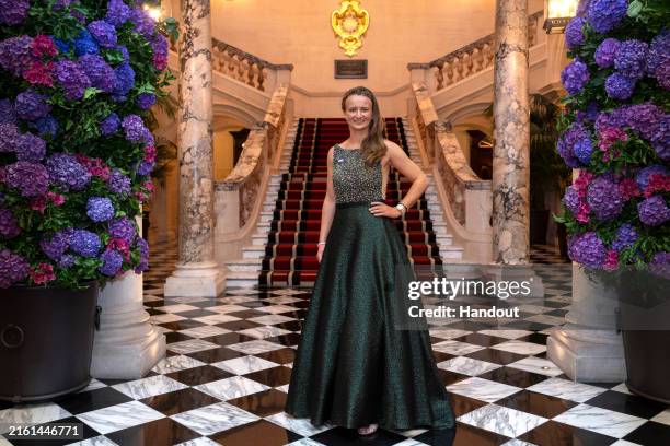 In this handout photo issued by AELTC, Barbora Krejcikova , 2024 Ladies' Singles winner, arrives at the Champions Dinner held at Raffles London at...