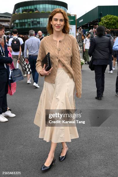 Alexa Chung, wearing Ralph Lauren, attends the Wimbledon Tennis Championships at the All England Tennis and Croquet Club on at Wimbledon on July 10,...